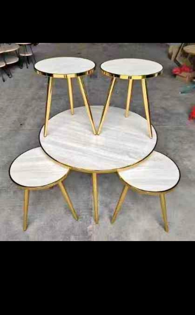 Centre table with side stools.